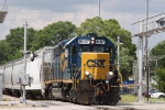 CSX 8097 leads a train towards Bennett Yard on the Andrews sub under threatening skies